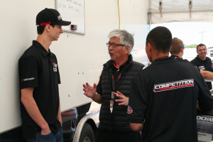 Michael Lewis is seen here speaking with Yokohama Tire's Chikara Cheech Yamauchi. The tire company is one of the sponsors of the IMSA Porsche GT3 Cup Challenge USA by Yokohama, which is the series Michael competes in this season.