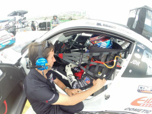 Competition Motorsports Team Owner Bob Faieta discusses strategy with Michael mid session during Qualifying on Friday, July 11.