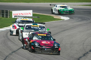 Michael Lewis leads a pack of cars in Round 7 of the Pirelli World Challenge at Barber Motorsports Park on Sunday, April 26, 2015. He finished the race in P6.