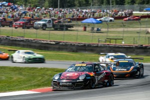 Michael Lewis is seen here during the Pirelli World Challenge Round 15 when he was part of a pack of cars challenging for position.
