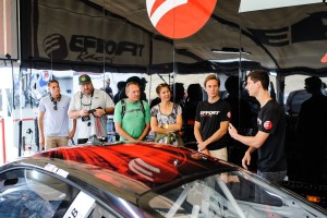 Michael Lewis enjoys describing his No. 41 EFFORT Racing/Curb-Agajanian Porsche 911 GT3 R to race fans who visited the EFFORT Racing paddock at Sonoma Raceway on Saturday, August 29.
