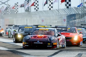 Michael Lewis leads the field of GT, GTA and GT Cup competitors into Turn 1 of Round 3 of the Pirelli World Challenge.