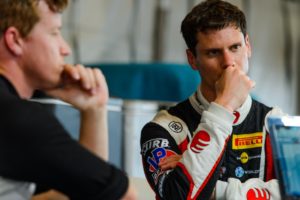 Michael Lewis and EFFORT Racing teammate Patrick Long consider race strategy after qualifying for the Grand Prix of Birmingham presented by Porsche, on Saturday, April 23.