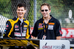 Michael and Calvert Dynamics team member Andrew Aquilante relax before the start of the race at Mid-Ohio Sports Car Course.