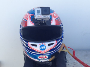 Attached to Michael Lewis' Bell HP7 Carbon Helmet is this GoPro Hero 3+ Black Edition Camera, which provides an "eye level" perspective of driving a Porsche 911 GT3 Cup Car. Attached to Michael Lewis' Bell HP7 Carbon Helmet is this GoPro Hero 3+ Black Edition Camera, which provides an "eye level" perspective of driving a Porsche 911 GT3 Cup Car.