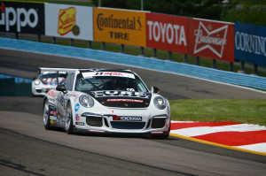 The No. 98 Competition Motorsports/Curb-Agajanian Porsche 911 driven by Michael Lewis hugs a turn at Watkins Glen International, in New York. The No. 98 Competition Motorsports/Curb-Agajanian Porsche 911 driven by Michael Lewis hugs a turn at Watkins Glen International, in New York.