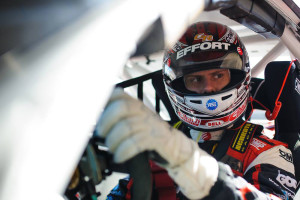 Michael Lewis listens to some last-minute instruction from the EFFORT Racing team before qualifying for the first event of the 2015 Pirelli World Challenge season.