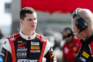 Michael Lewis discusses race strategy with EFFORT Racing Team Engineer Stefan Pfeiffer.
