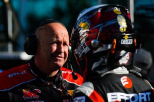Michael Lewis receives some final advice from EFFORT Racing Technical Director Stefan Pfeiffer prior to Saturday's qualifying session.