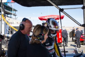 Michael Lewis reviews telemetry with Calvert Dynamics team members Stefan Pfeiffer and Erin Gahagan. Photo by Halston Pitman, MotorSport Media.